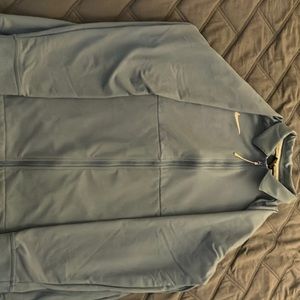 Selling a Nike quarter zip you can also wear for business purposes.